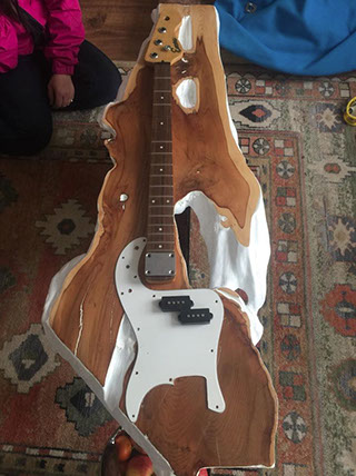 Bespoke table made from an electric guitar